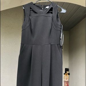 Black Calvin Klein jumpsuit with pockets.